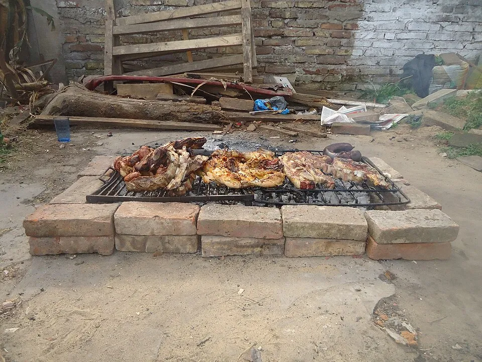 Meat over coals on an Argentine parrilla