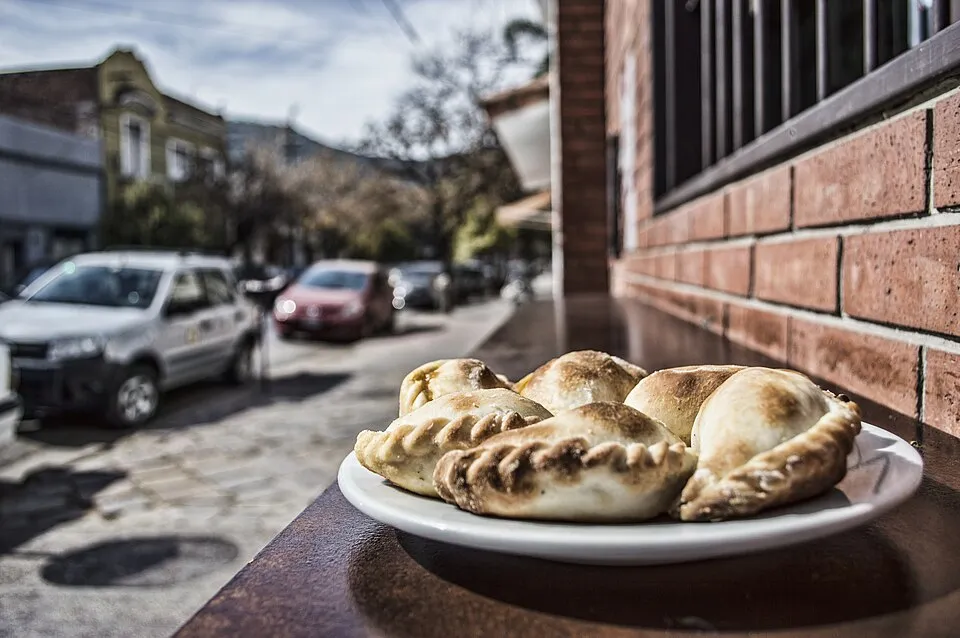 A tray of salteña empanadas