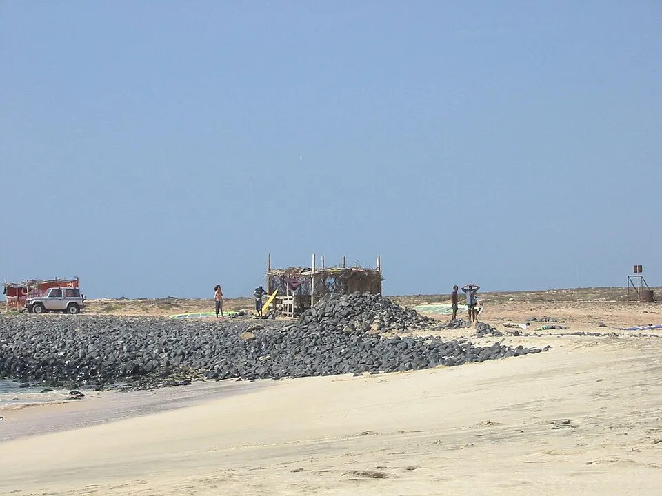 The beach and dark point at Ponta Preta